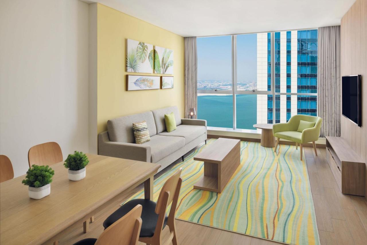Element By Westin City Center الدوحة المظهر الخارجي الصورة A typical living room in a two-bedroom apartment