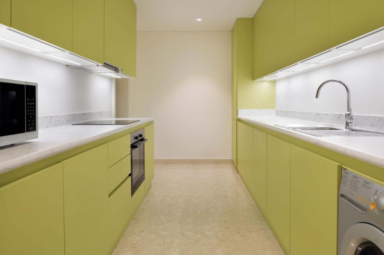 Element By Westin City Center الدوحة المظهر الخارجي الصورة A kitchen in a typical apartment